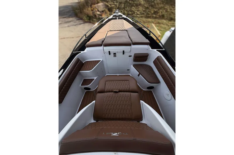  Yacht Photos Pics 2006 Donzi 35 ZF Cuddy interior with brown leather seating and sleek design.