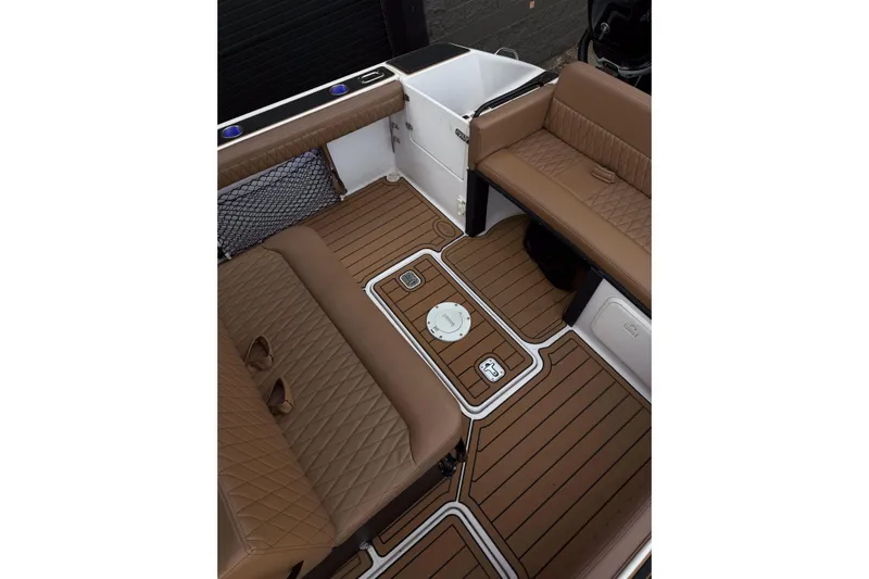  Yacht Photos Pics 2006 Donzi 35 ZF Cuddy interior with brown leather seating and wood-style flooring.