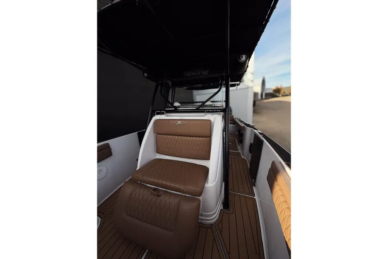  Yacht Photos Pics 2006 Donzi 35 ZF Cuddy interior with brown leather seating and sleek design.