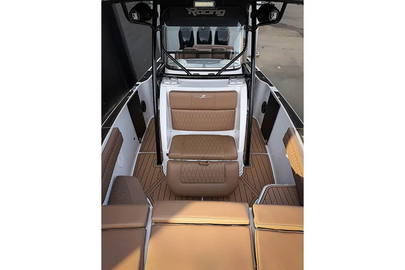  Yacht Photos Pics 2006 Donzi 35 ZF Cuddy interior with tan seating and sleek design.