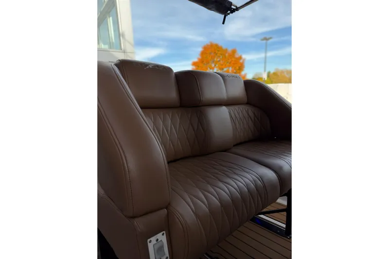  Yacht Photos Pics Brown leather seating on 2006 Donzi 35 ZF Cuddy boat, with quilted design.