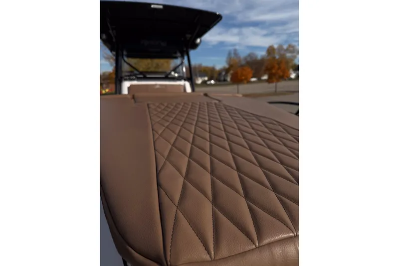  Yacht Photos Pics 2006 Donzi 35 ZF Cuddy boat with diamond-stitched brown leather upholstery.