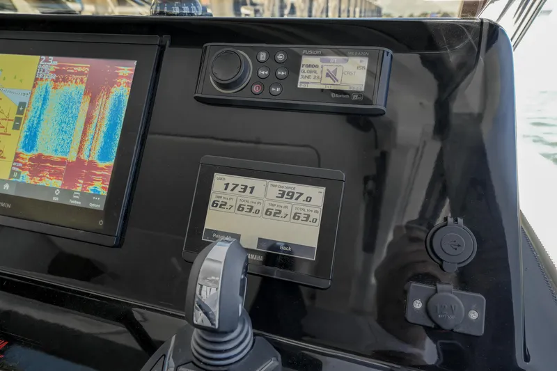  Yacht Photos Pics Control panel of 2024 Jeanneau NC1095 Fly with navigation and engine displays.