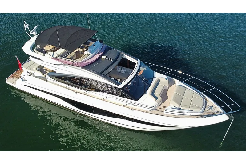 B III Yacht Photos Pics Luxurious 2021 Princess S62 yacht with sleek design, cruising on open water.