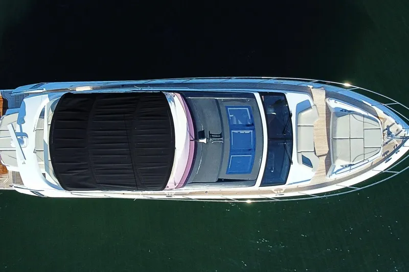 B III Yacht Photos Pics Aerial view of 2021 Princess S62 yacht with sleek design and spacious deck.
