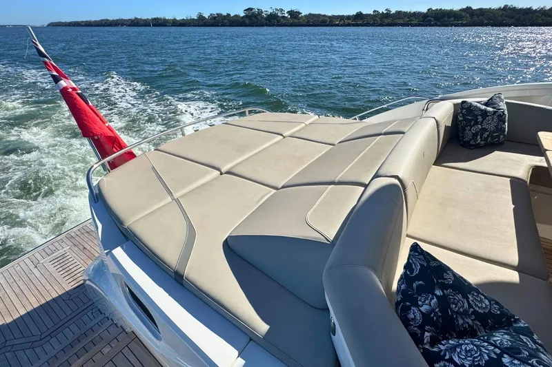 B III Yacht Photos Pics Luxurious 2021 Princess S62 yacht with spacious sun deck and elegant seating.