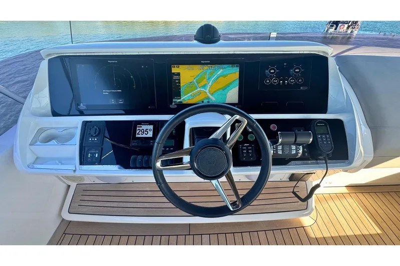 B III Yacht Photos Pics 2021 Princess S62 yacht helm with navigation screens and controls.