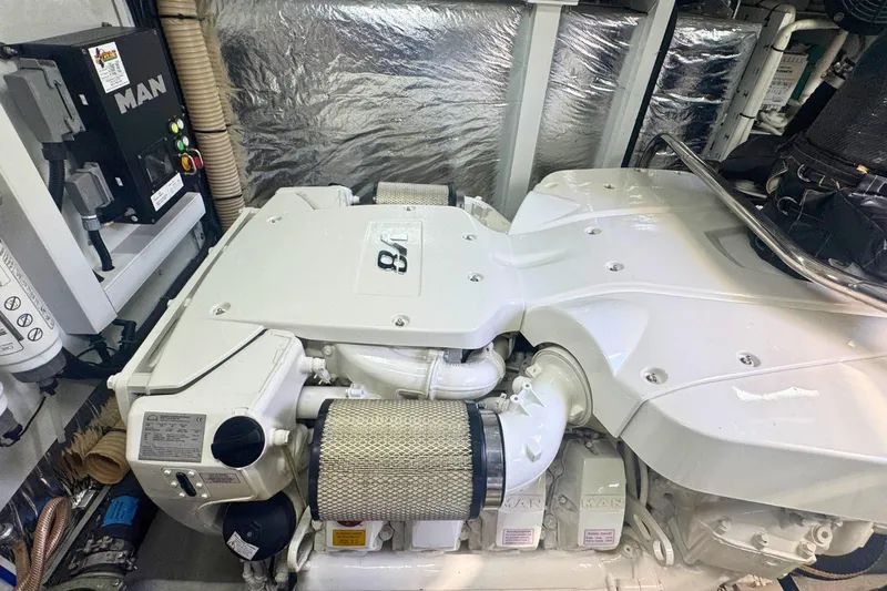 B III Yacht Photos Pics Engine room of a 2021 Princess S62 yacht featuring a MAN engine.