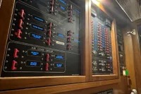 Electrical control panel on a 2007 Trader 42 HT yacht, featuring labeled switches and indicators.