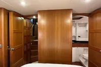 Luxurious interior of 2007 Trader 42 HT yacht with wooden finishes and modern amenities.