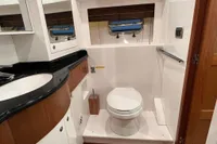 Luxurious bathroom in 2007 Trader 42 HT yacht with modern fixtures and elegant design.