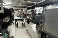Engine room of 2007 Trader 42 HT yacht, showcasing machinery and equipment.