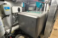 Engine room of 2007 Trader 42 HT yacht with electrical equipment and wiring.