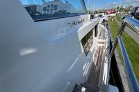 Side view of a 2007 Trader 42 HT yacht docked at a marina.