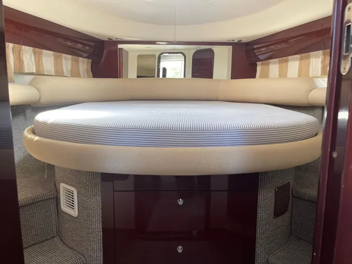  Yacht Photos Pics Interior cabin of 2006 Princess V42 yacht with round bed and elegant design.