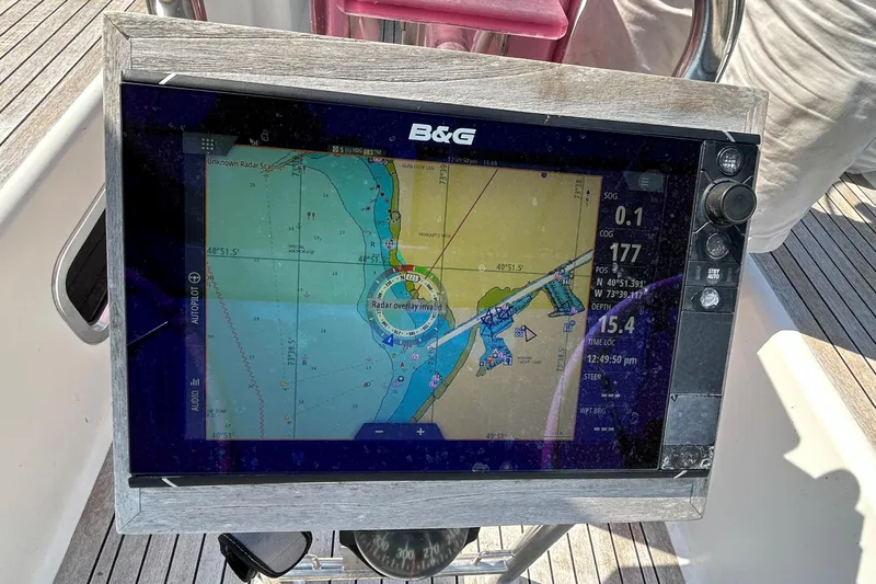 Scacciapensieri Yacht Photos Pics Navigation display on 2008 Hanse 470e sailboat, showing nautical chart and radar overlay.