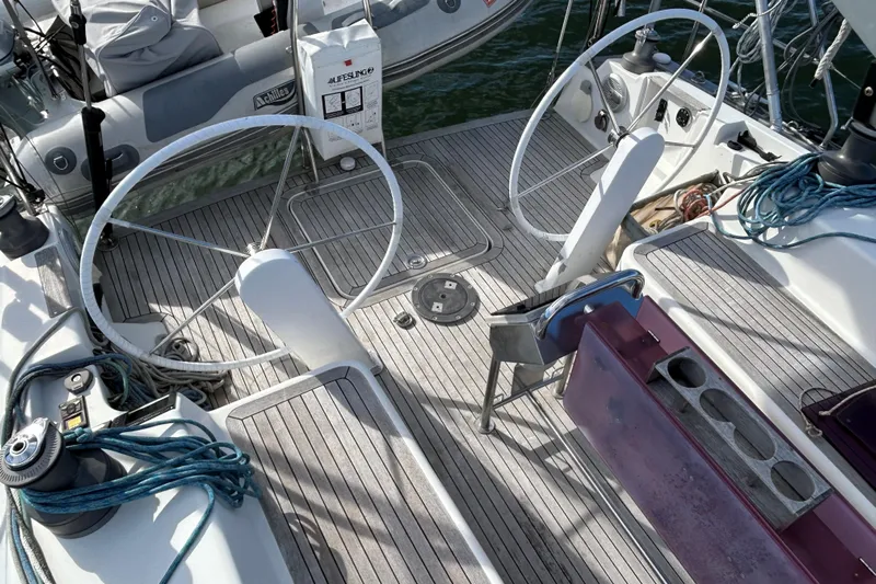 Scacciapensieri Yacht Photos Pics 2008 Hanse 470e yacht cockpit with dual steering wheels and deck equipment.