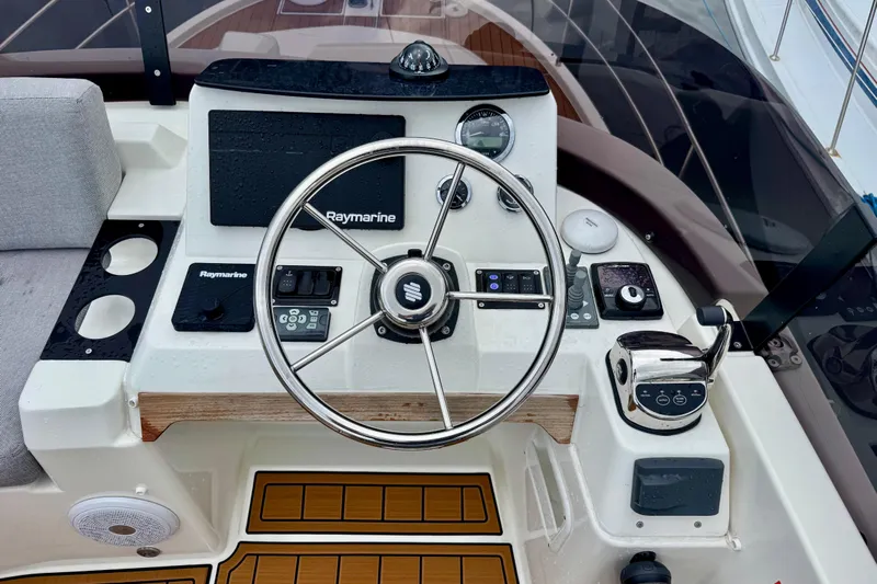  Yacht Photos Pics Helm of 2025 Beneteau Swift Trawler 35 with Raymarine navigation system.