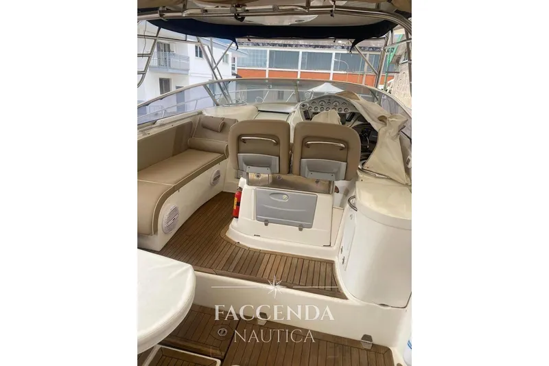  Yacht Photos Pics 2008 Cranchi Zaffiro 36 yacht interior with seating and control panel.