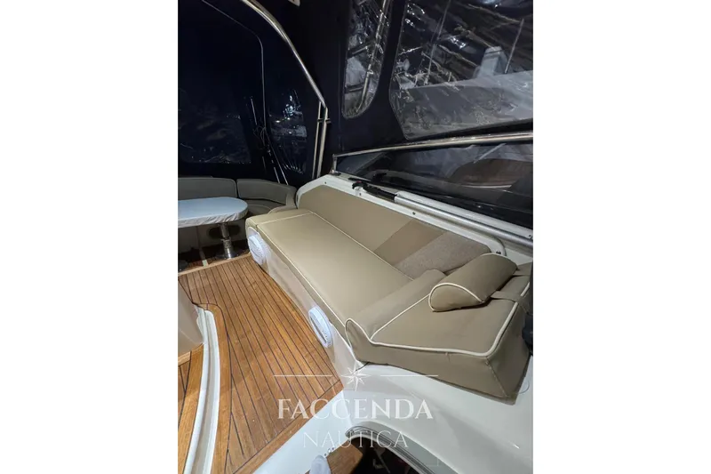  Yacht Photos Pics 2008 Cranchi Zaffiro 36 interior with beige seating and wooden flooring.