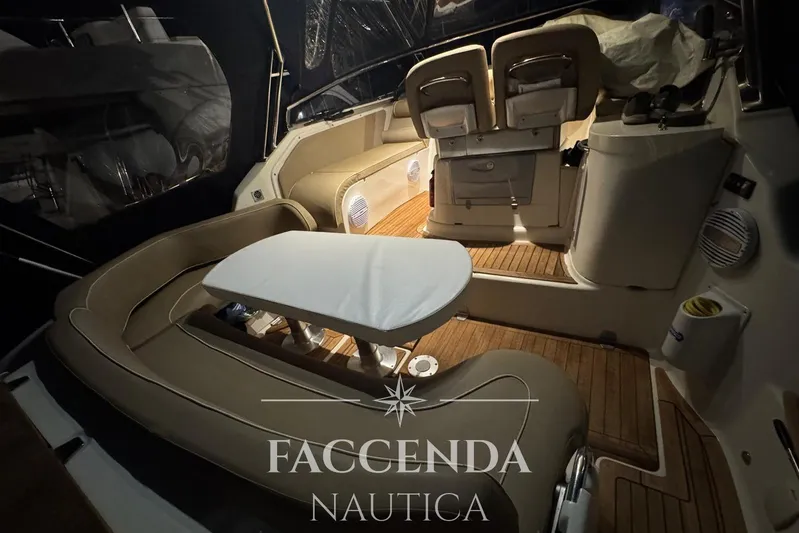  Yacht Photos Pics 2008 Cranchi Zaffiro 36 yacht interior with elegant seating and wooden flooring.