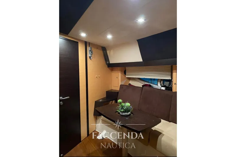  Yacht Photos Pics Interior of 2008 Cranchi Zaffiro 36 yacht with cozy seating and modern decor.