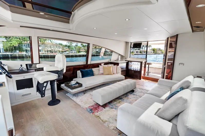 Liquid Asset Yacht Photos Pics Luxurious interior of 2010 Lazzara 78 Fly yacht with modern seating and large windows.