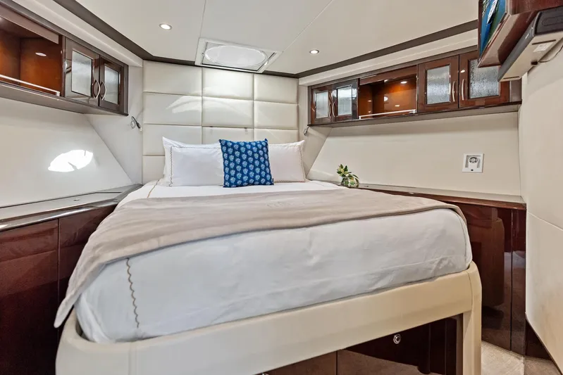 Liquid Asset Yacht Photos Pics Luxurious bedroom interior of 2010 Lazzara 78 Fly yacht with elegant bedding.
