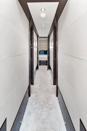 Liquid Asset Yacht Photos Pics Hallway inside 2010 Lazzara 78 Fly yacht, featuring modern design and recessed lighting.