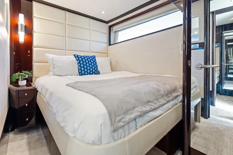 Liquid Asset Yacht Photos Pics Luxurious bedroom interior of 2010 Lazzara 78 Fly yacht with modern decor.