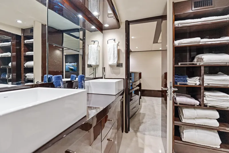 Liquid Asset Yacht Photos Pics Luxurious bathroom interior on 2010 Lazzara 78 Fly yacht with modern fixtures and ample storage.