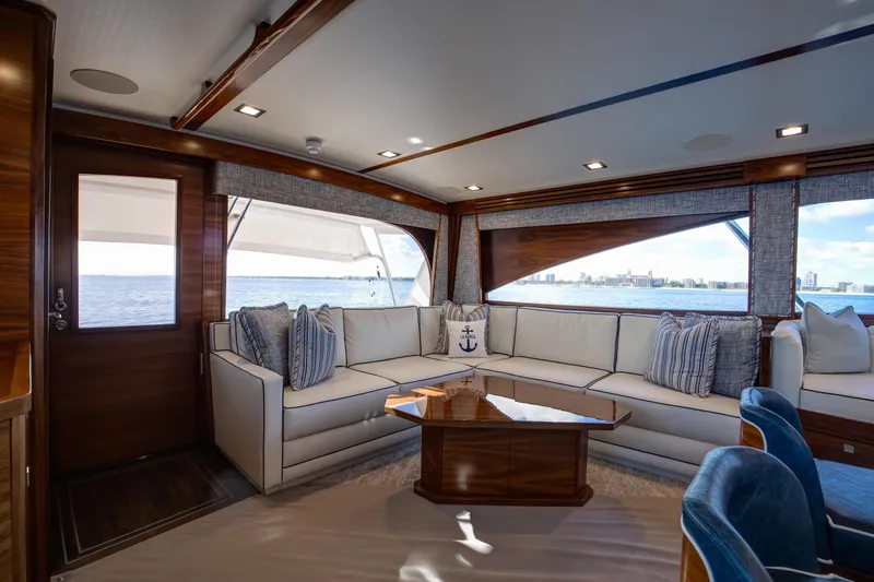 La Barca Yacht Photos Pics Luxurious interior of 2024 Viking 68 Convertible yacht with elegant seating and ocean view.