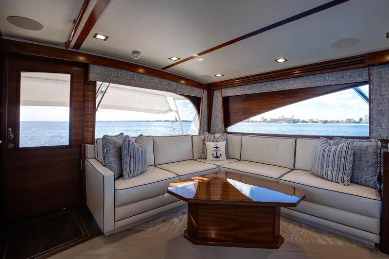 La Barca Yacht Photos Pics Luxurious interior of 2024 Viking 68 Convertible yacht with ocean view.