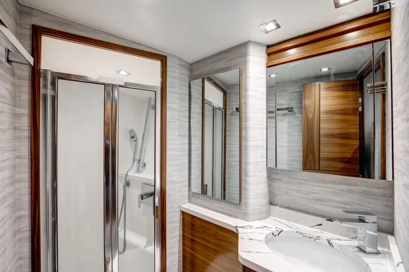 La Barca Yacht Photos Pics Luxurious bathroom in 2024 Viking 68 Convertible yacht with modern fixtures and elegant design.