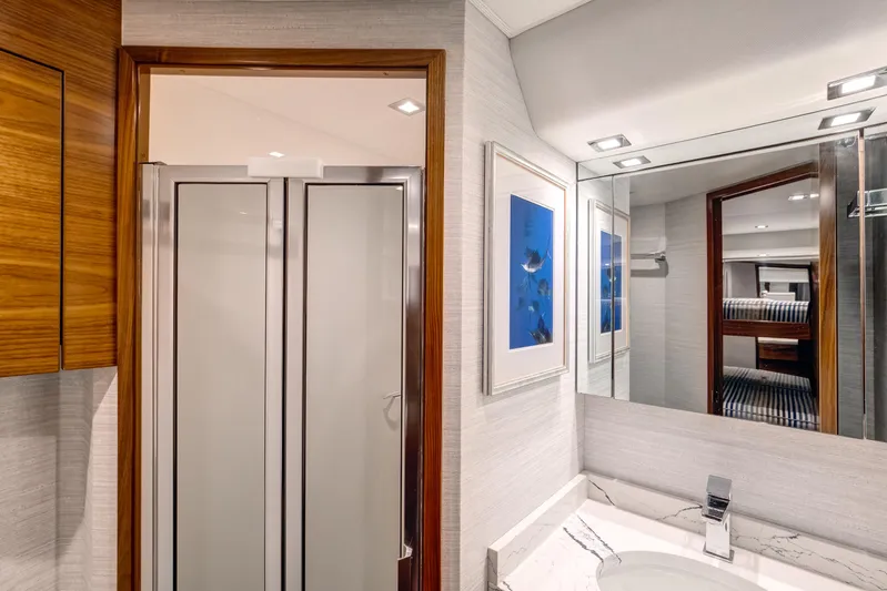 La Barca Yacht Photos Pics Luxurious bathroom in 2024 Viking 68 Convertible yacht with modern fixtures and elegant design.