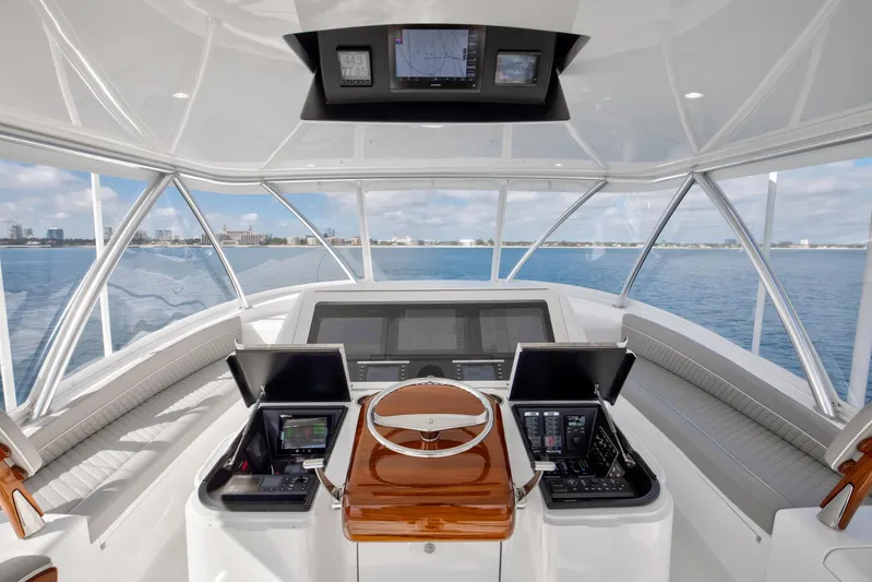 La Barca Yacht Photos Pics 2024 Viking 68 Convertible yacht helm with advanced navigation systems and panoramic ocean view.