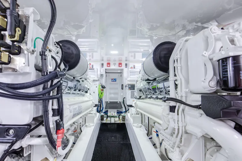 La Barca Yacht Photos Pics Engine room of 2024 Viking 68 Convertible yacht, showcasing advanced machinery and clean design.