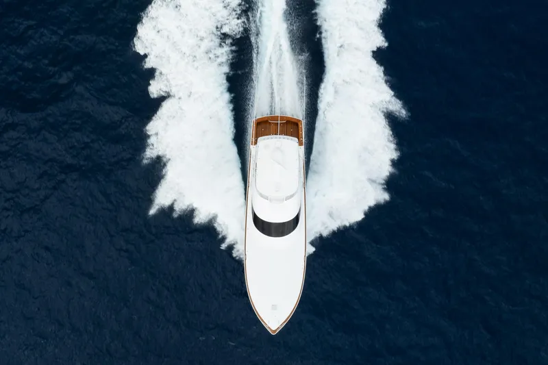 La Barca Yacht Photos Pics Aerial view of 2024 Viking 68 Convertible yacht cruising on open water.
