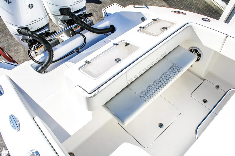  Yacht Photos Pics 2026 Invicta 320 CC boat interior with dual engines and seating area.
