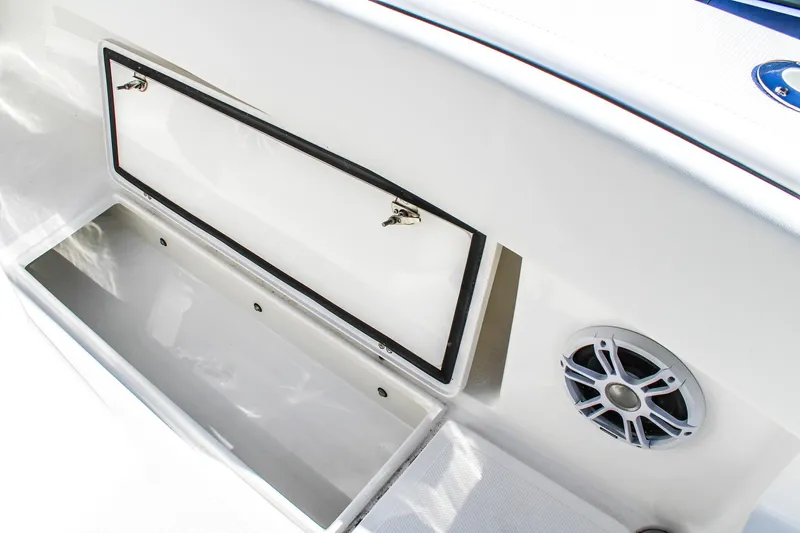  Yacht Photos Pics Open storage compartment and speaker on 2026 Invicta 320 CC boat.