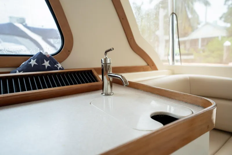 Moondance Yacht Photos Pics Interior of 2006 Sabre 42 Express yacht with sink and window view.