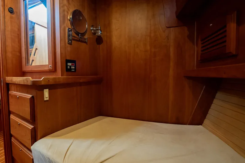 Moondance Yacht Photos Pics 2006 Sabre 42 Express cabin interior with wooden finish and cozy sleeping area.