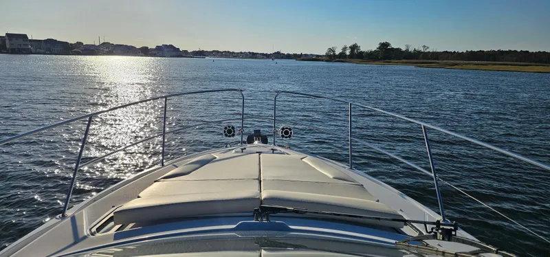 Mambo Italiano Yacht Photos Pics Bow view of 2015 Beneteau 38 Gran Tourismo yacht cruising on a sunny day.