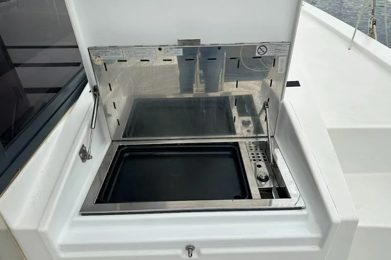  Yacht Photos Pics Outdoor grill on 2021 Bali 4.6 yacht, featuring stainless steel design and control knobs.