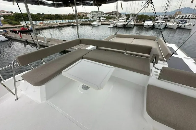  Yacht Photos Pics Luxurious 2021 Bali 4.6 yacht deck with comfortable seating and marina view.