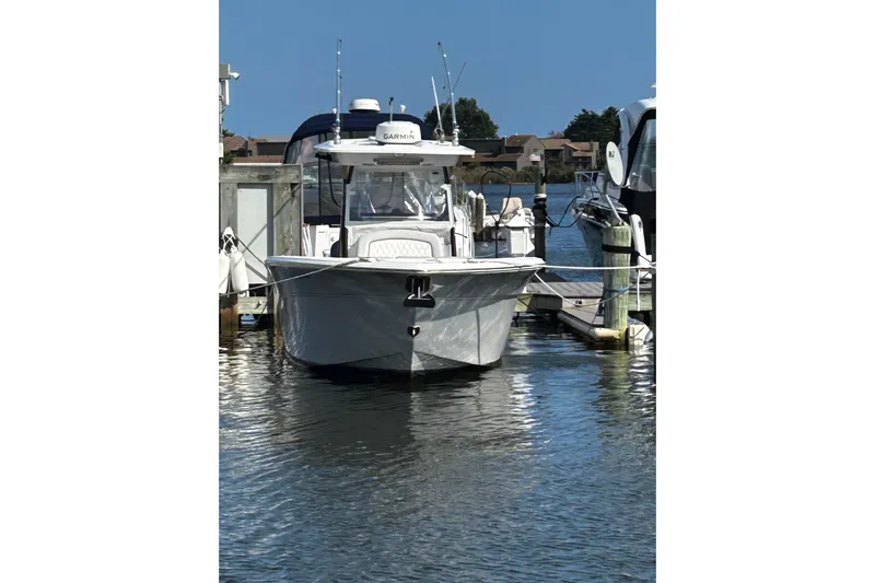  Yacht Photos Pics 2021 Sea Fox 288 Commander boat docked in a marina, front view.