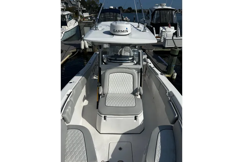  Yacht Photos Pics 2021 Sea Fox 288 Commander boat with Garmin equipment, docked at marina.
