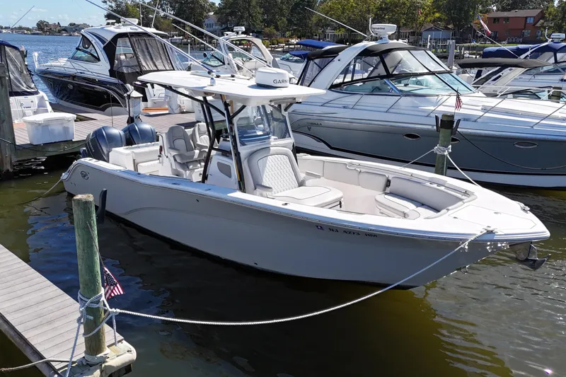  Yacht Photos Pics 2021 Sea Fox 288 Commander boat docked at marina, surrounded by other vessels.