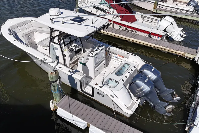  Yacht Photos Pics 2021 Sea Fox 288 Commander boat docked with twin Yamaha engines.