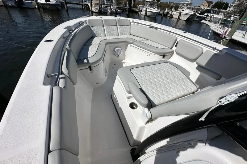  Yacht Photos Pics 2021 Sea Fox 288 Commander boat interior with cushioned seating and sleek design.
